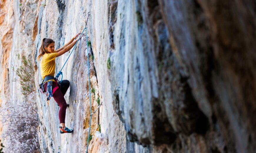 Girl,Climbs,A,Rock.,Rock,Climber,Girl.,Rock,Climbing,As
